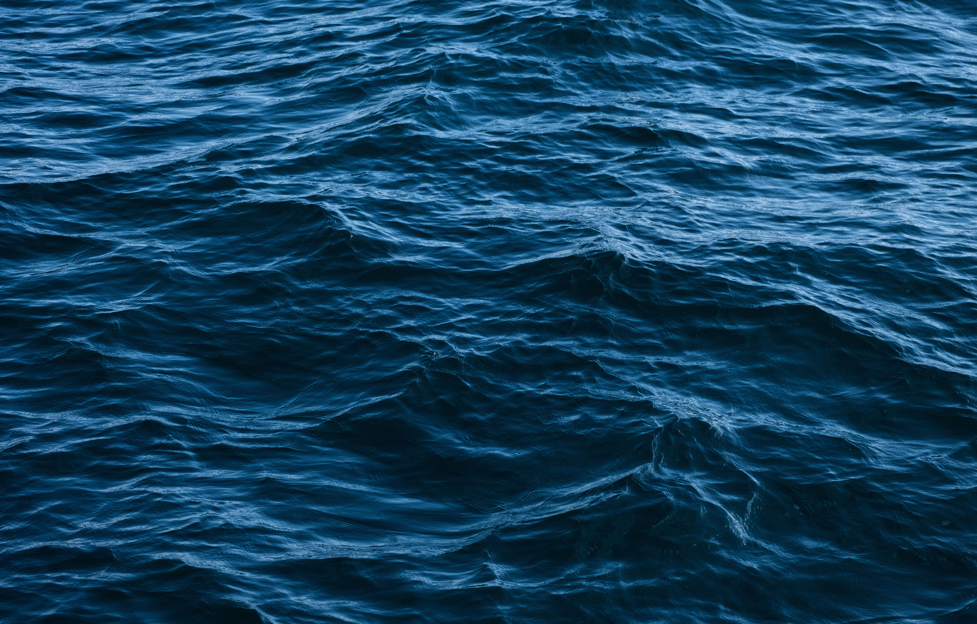 dark blue ocean waves background